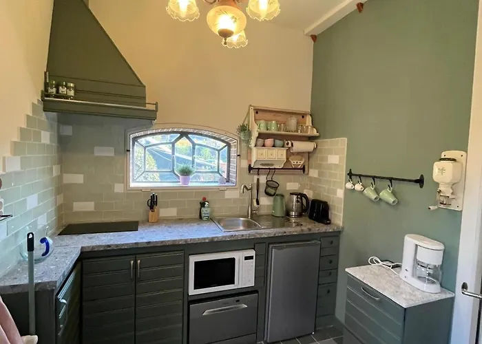 Het Koetshuis * خودا