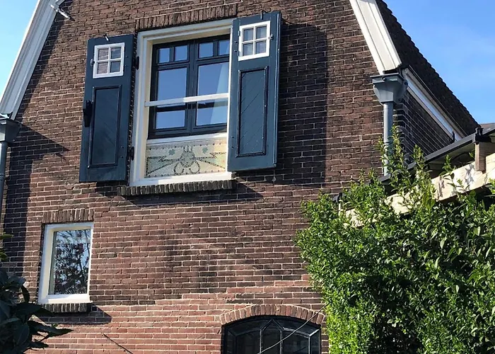 Het Koetshuis خودا